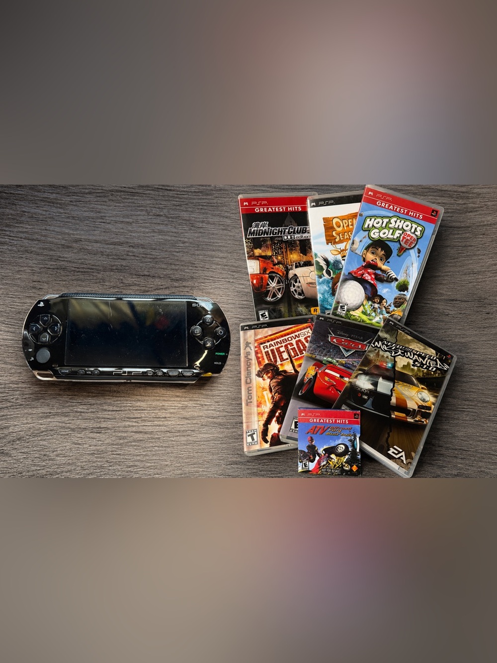 Sony PSP Handheld System With Charger, 8GB Memory Card And 7 Games